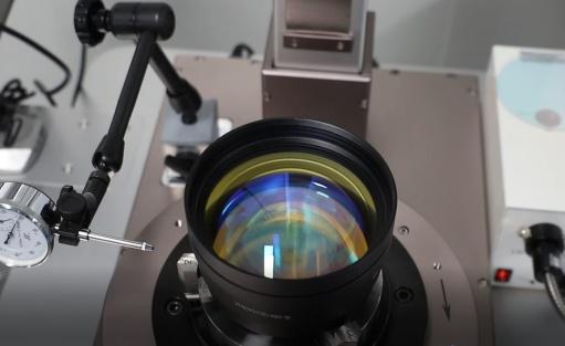 Precision optical lens assembly and alignment on testing equipment